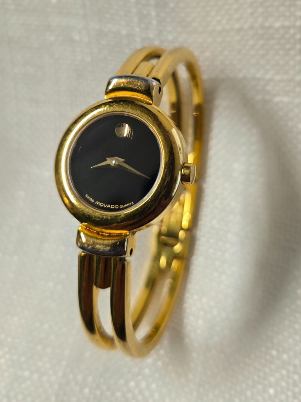 Movado Museum Dial Gold-Tone Bangle Watch Black Dial Quartz (88.A1.809.A)